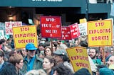 Crowd on 7th Avenue in Seattle, Washington Nov. 29, 1999 protesting against the World Trade Organization.