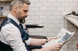 Man reading a newspaper