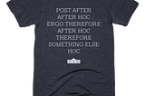 A t-shirt with the West Wing logo reading ‘Post after, after hoc, ergo therefore, after hoc therefore, something else, hoc”