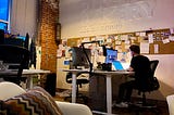 Jordan Lambrecht sitting at his desk at Pixel Bakery being very sleepy at 1:00am