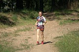 woman ultrarunner on a trail