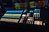 A control pannel with lots of lights and buttons