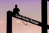 Construction worker woking on a building. There is a text on building describing the article “Case Study: Rozgar”