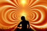 yellow and red waves of energy flow out from woman’s silhouette