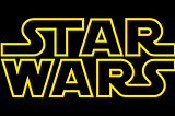 A black background with block letters outlined in yellow and filled with black spelling out “STAR WARS.”