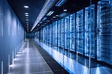 A server room with racks of servers. Photo by Nikada/Getty Images