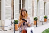 Woman looking intently at her phone