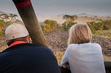 Why is a wildlife safari in Tanzania an unforgettable travel experience for honeymooners?