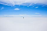 Person walking on an empty landscape