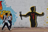 In June 2025, Bangladesh’s International Crimes Tribunal (ICT) began proceedings against former Prime Minister Sheikh Hasina over alleged crimes in the July–August 2024 uprising. What began as a public reckoning soon sparked debate over whether this is fair justice — or a political spectacle. With the chief prosecutor, once a defense lawyer for accused war criminals, openly calling the trial “a pledge for the future,” questions loom over process, impartiality, and democratic impact.