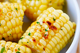 Garlic-Herb Butter Roasted Corn