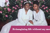 A black woman and her adult daughter are seated and holding hands.