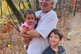 Bob and our grands enjoying the park on a warm spring day.