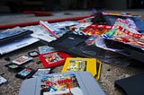 A few broken Nintendo cartridges of Pokémon games