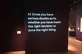 A black board with white writing reading “At times you have serious doubts as to whether you have made the right decisions”