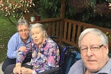 Far Left Rosie my Sister, and me David visiting Jeanne centre in the Garden at Shelton Lock Nursing Home, Derby