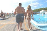 Why Do Sexy Women Date Fat Guys?
