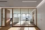 Elevate Your Space with Stylish Wooden Frame Glass Partitions