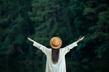 Female tourists spread their arms and held their wings