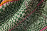 green and white binakul patterned inabel cloth with pink and orange details