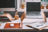 Laptops and notebook on a desk