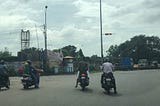 A picture taken on Garden Reach Circular road on 29-Jun-2019 — the riders of the second motorcycle wearing skullcaps