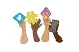 Hands showing different social media activism tools