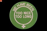Lime-green button with white text “We have been too nice too long” inside female gender symbol