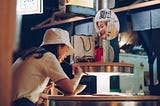 Japanese woman eating in a restaurant