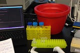 A biology lab desk with a laptop.