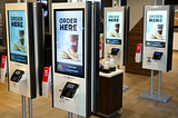 Photo of Self-Service kiosks at a McDonald’s