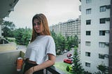 Attractive Woman on Balcony