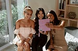 Three women taking a selfie