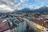 View of the city of Innsbruck and the mountains behind it, taken from the top of the city’s historic tower.