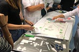 1+1 = 3, when Architecture meets Service Design
