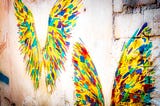 Angel wings painted on the wall in the Old City of Cartagena, Colombia