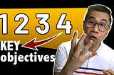 Image of a person on the right showing 4 fingers. On the left the numbers 1 2 3 4 is shown and a with an arrow pointing to the text ‘KEY objectives’