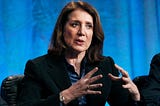 Ruth Porat can’t pay her own “Relocation” costs?