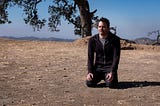 Bill Hader as Barry kneeling on the ground.