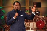 Pastor Chris Oyakhilome leads a prayer during a televised prayer service during the coronavirus pandemic.