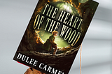 “Unveiling the Mystical Tapestry: The Magic Within ‘Heart of the Wood’ by Dulee Carmel”