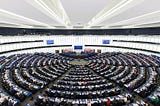 A large white circular room that houses all the European Union’s representitaves.