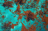 Globby brown oil floating in turquoise blue water. Image source: https://www.rawpixel.com/image/8732347/photo-image-public-domain-blue-pattern