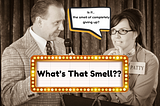 Old-timey black and white game show image of a male host and female contestant with a name tag that reads “Patty.” A marquee banner at the bottom reads “What’s That Smell?” A speech bubble from Patty reads “Is it… the smell of completely giving up?”