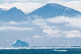 Icebergs drift along near Ramah Bay in Torngat Mountains National Park in Labrador in eastern Canada. (story and all photos © April Orcutt — all rights reserved)