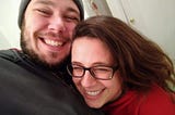 Man and woman laughing