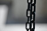 A hanging black chain