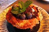 Freshly Fried Churro Cup filled with blueberry, oreo, and cream cheese at Nonsense Cafe & Bar