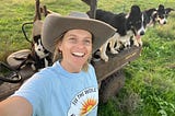 Photo of Molly, supporter of the World Transformation Movement, with her working dogs.