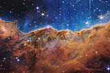 “Cosmic Cliffs” in the Carina Nebula from NASA’s James Webb Space Telescope (NIRCam Image)